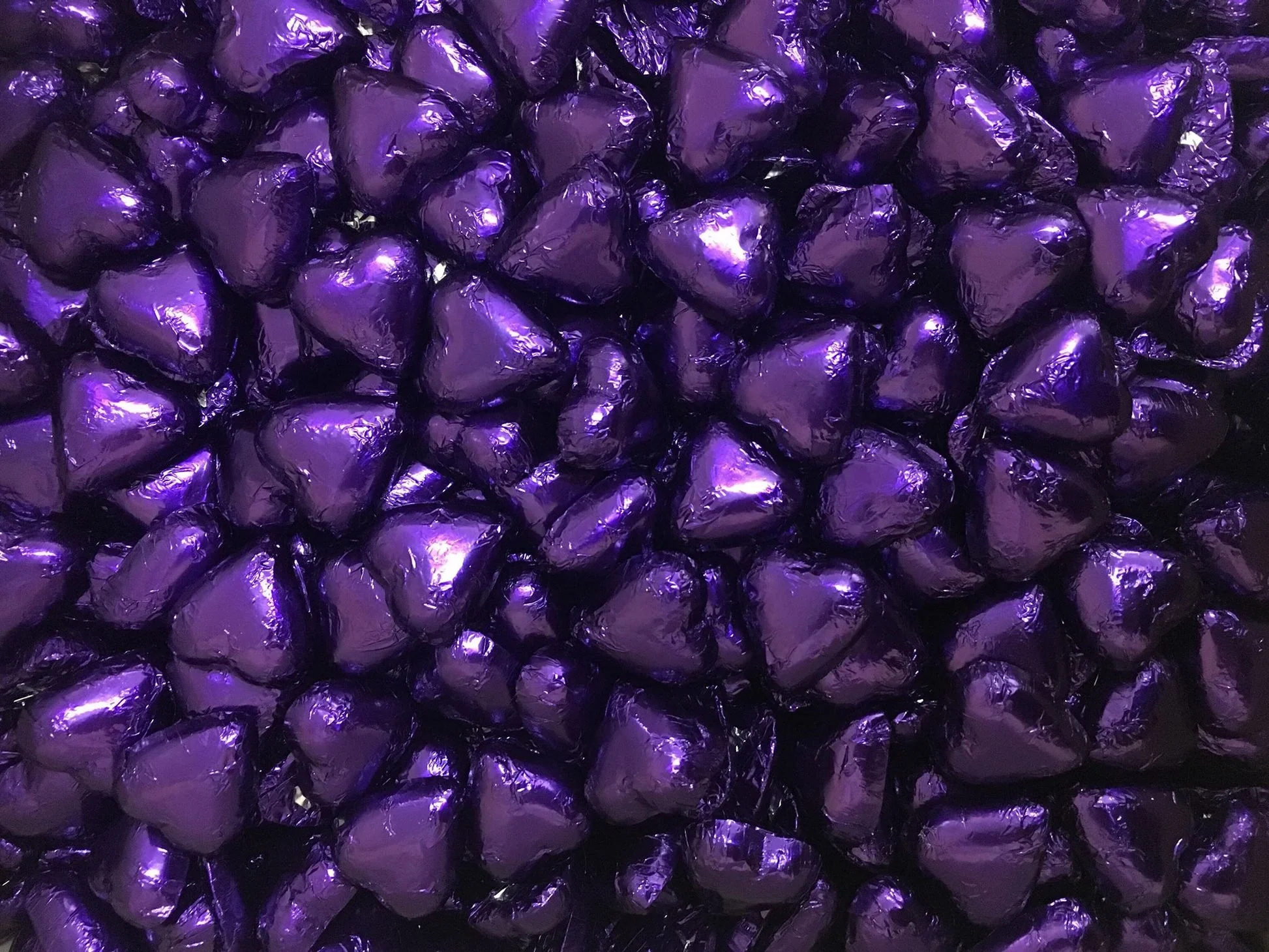 Toms Choc Hearts 1kg purple foiled in cello bag