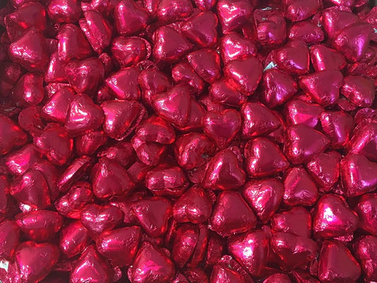 Toms Choc Hearts 1kg fuschia foiled in cello bag